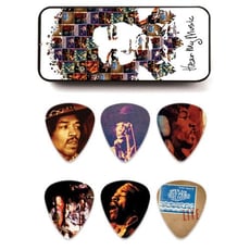 Dunlop Jimi Hendrix JHPT07M  - Com imagens exclusivas apresentando Jimi gravando e tocando ao vivo, O Dunlop Jimi Hendrix JHPT07M ouvir minha música Pick Tin contém seis escolhas com imagens exclusivas de Jimi tocando a música q...