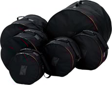 Tama  DSS72S Standard Bag Set - A Tama DSS72S Standard Bag Set é um saco de 7 peças da série padrão., Os sacos acolchoados feitos de nylon de 600 denier são à prova de ruptura, impermeáveis, robustos e garantem o transporte e arm...
