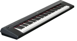 Yamaha Piaggero NP-32 B Piano Digital - 76 teclas com Graded Soft Touch, 10 sons diferentes (Piano 1, Piano 2, E. Piano 1, E. Piano 2, Organ 1, Organ 2, Strings, Vibes, Harpsi 1, Harpsi 2), Polifonia de 64 vozes, Reverb (4 tipos), Predef...